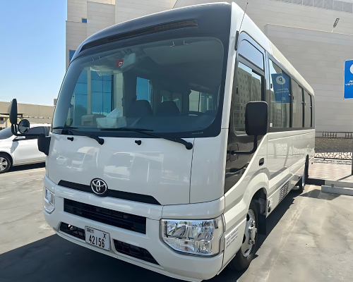 22-Seater Coaster Bus Rental Slide 1
