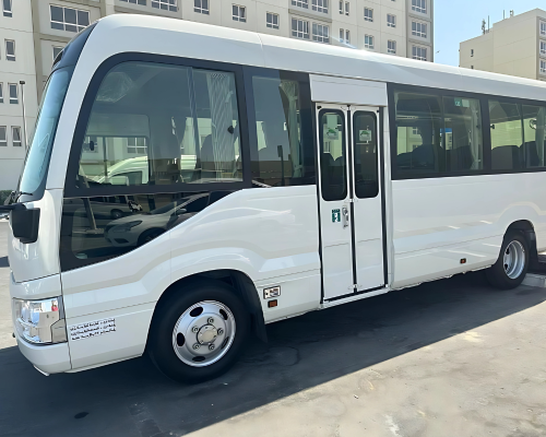 22-Seater Coaster Bus Rental Slide 2
